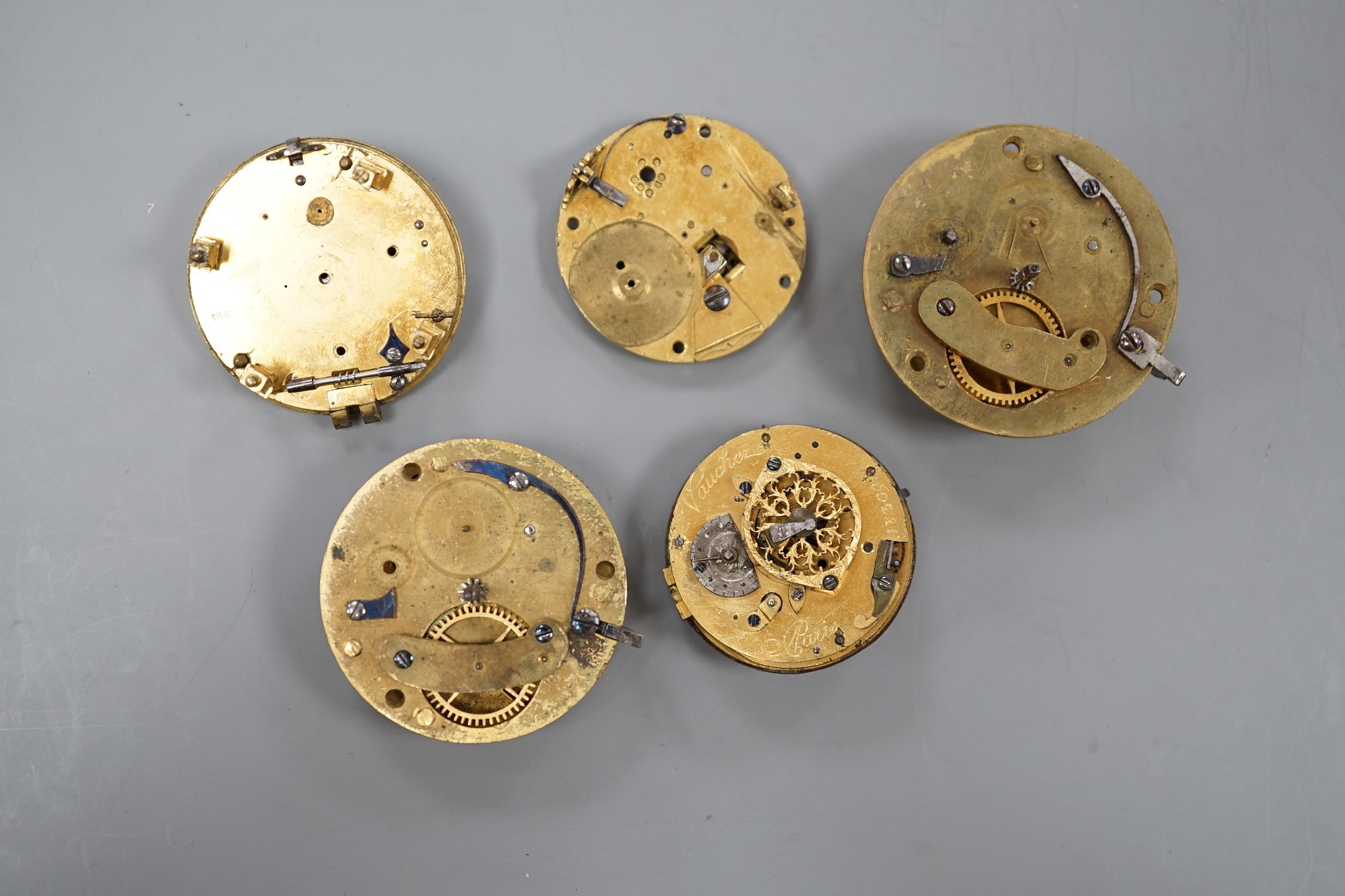 Five assorted 19th century pocket watch movements/accessories including English by Smart of London and French by Vaucher of Paris.